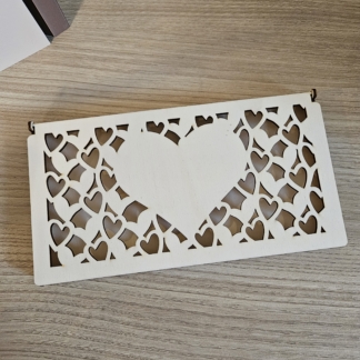 Scatolina in legno traforata con cuore